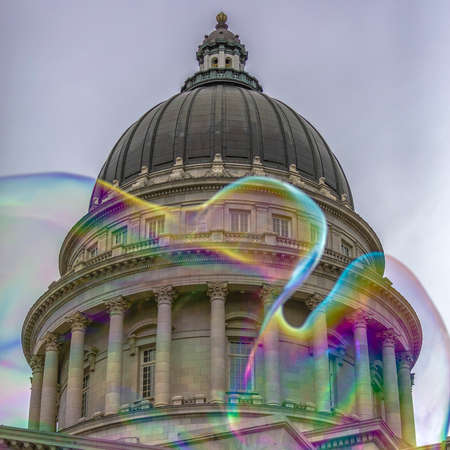 Bubble and Utah State Capital building against skyの写真素材