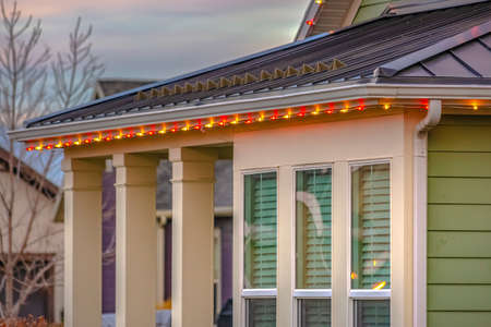 Christmas lights framing the roof of home in Utahの写真素材