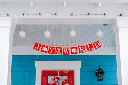 Exterior of home with cheerful holiday decorationsの写真素材