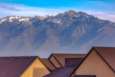 Home against Mount Timpanogos and sky in Daybreakの写真素材