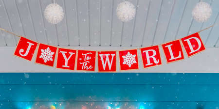 Home exterior with holiday bunting and light ballsの写真素材