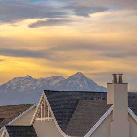 Homes against Wasatch mountains in Daybreak Utahの写真素材
