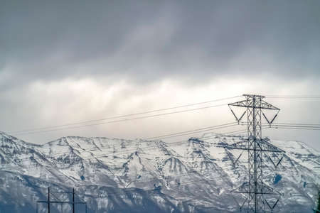 Power Line in Cedar Valley against Lowe Peakの写真素材