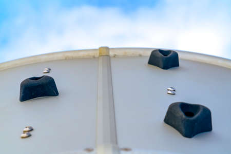 Playground climber with black foot and hand holdsの写真素材