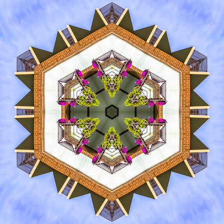 Abstract hexagon balcony shape with flowers on rails. Geometric kaleidoscope pattern on mirrored...