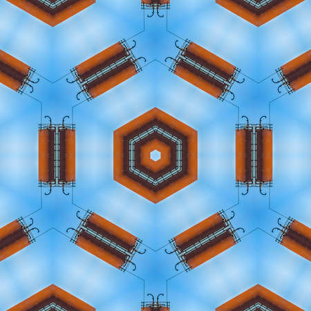 Abstract tiled design made from industrial photo. Geometric kaleidoscope pattern on mirrored axis of...