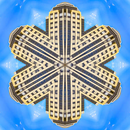 Angular star shape made from apartment complex. Geometric kaleidoscope pattern on mirrored axis of...