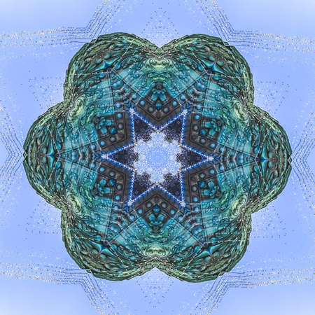 Round shape made from a copper fountain photo. Geometric kaleidoscope pattern on mirrored axis of...