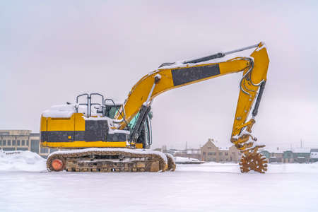 Construction vehicle on a winter landscape in Utahの写真素材