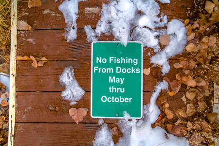 No Fishing From Docks May Thru October sign