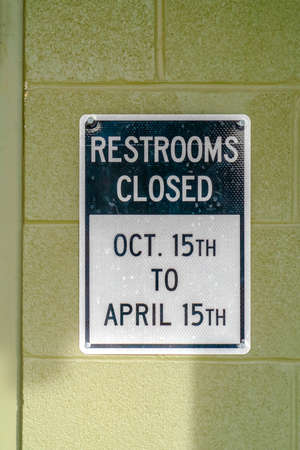 Restrooms Closed sign on a parks public restroomの写真素材