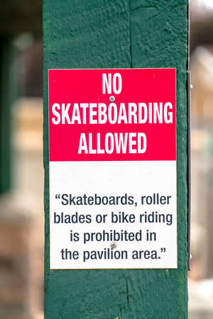 No Skateboarding Allowed sign on a wooden postの写真素材