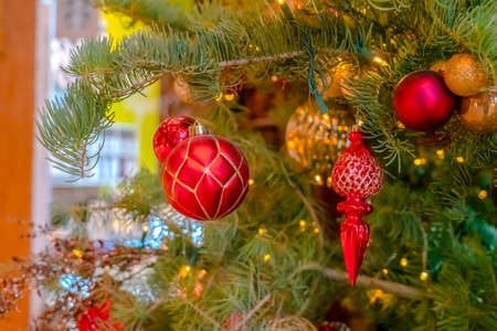 Christmas tree with red and gold decorationsの写真素材