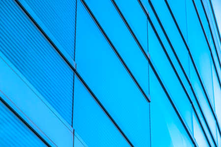 Close up of modern building glass windows exteriorの写真素材
