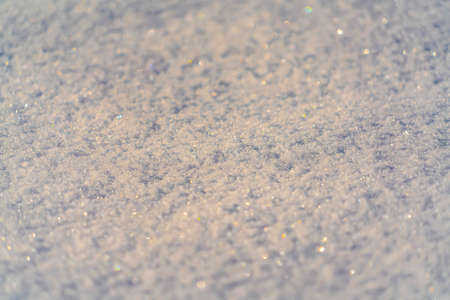 Glittering crystalline snow in Eagle Mountain Utah. Close up glittering crystalline white snow in Eagle Mountain, Utah in winter. Snowy view on a frosty December day in Utah Valley.の写真素材
