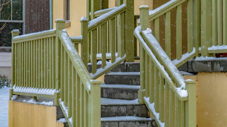 Panorama Entrance of a home in Daybreak Utah viewed on a snowy winter day in December