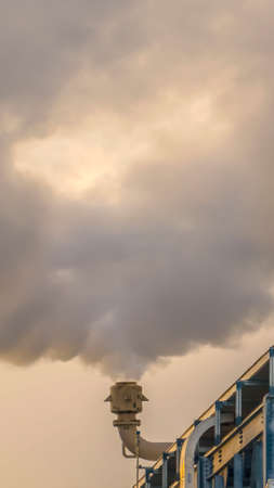 Clear Vertical Thick steam emitted from the smokestack of a Power Plant in Utah Valley. Close up of...