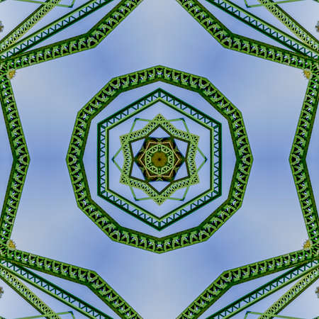 Symmetrical angular circle design created from doubling a photo of a green bridge in California....