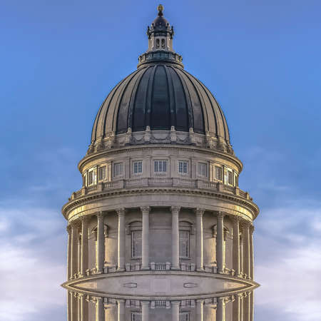 Square frame Dual mirrored dome of the Utah State Capital. Geometric kaleidoscope pattern on mirrored axis of symmetry reflection. Colorful shapes as a wallpaper for advertising background or backdrop.の写真素材