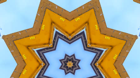 Panorama A pointed star shape made from a yellow tractorの写真素材