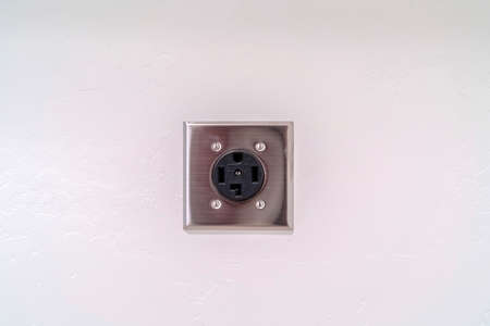 Electric plug connection for a washing machine