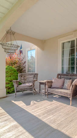 Vertical Traditional home porch and deck with no people. A traditional, modern home porch and deck area with no people.の写真素材