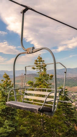 Vertical Chairlift overlooking the scenic Park City Utah landscape on a sunny summer dayの写真素材