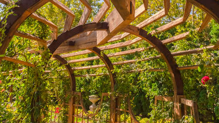 Panorama frame Close up of the wooden arbor at a wedding venue under blue sky on a sunny day