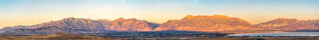 Panoramic view on valley and mountain in Utah. Wide panoramic view of the valley and mountain in Utah with clear sky in the morningの写真素材