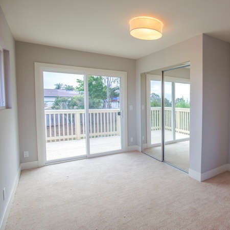 Square frame Empty bedroom in a model home in southern Californiaの写真素材