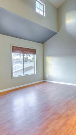 Vertical frame Empty bedroom in a model home in southern California