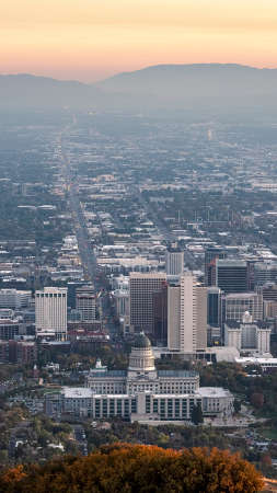 Vertical frame Aerial view of the Utah State Capitol Building in hazy light in Salt Lake City Utah...