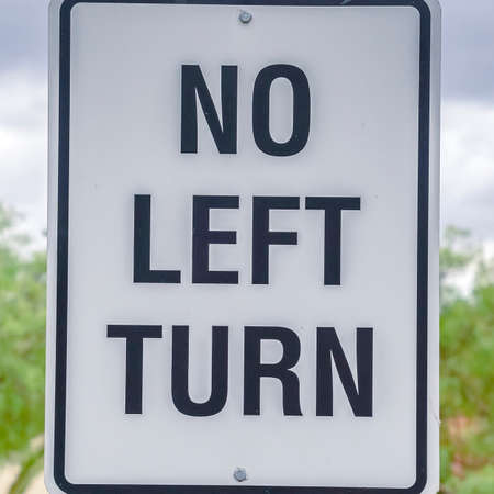Square No Left Turn traffic sign on a poleの写真素材