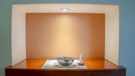 Panorama frame Bowl of wafers and decanter of wine in a churchの写真素材
