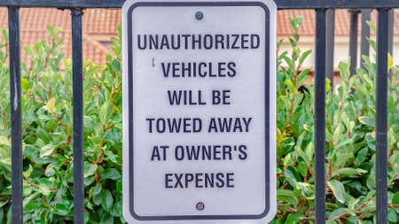 Panorama No parking for unauthorized vehicles warning signの写真素材