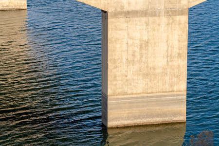 The pier of abutment of a springer bridge that supports the span of the deck. View of the pier of a...