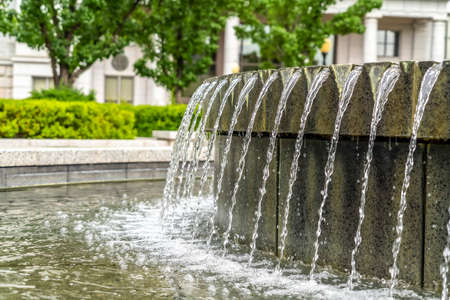 Close up view of water fountain outside Utah State Capitol Building. Scenic views within the grounds of the historic legislative building in Salt Lake City.の写真素材