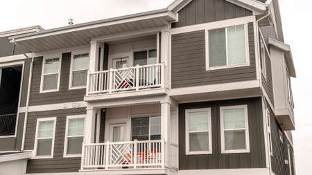 Panorama Small modern apartment block with balconies day lightの写真素材