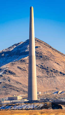 Vertical Garfield Smelter Stack - smokestack west of Magna, Utah, alongside Interstate 80 near the Great Salt Lakeの写真素材