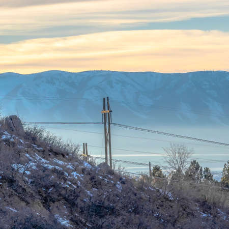 Square frame Provo Canyon Utah landscape of hill overlooking the valley and distant mountainの写真素材