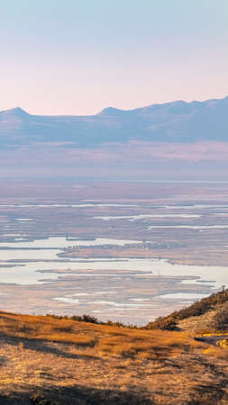 Vertical View from a mountain summit of wetlandsの写真素材