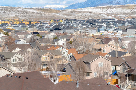 Utah Valley terrain with houses overlooking scenic view of Wasatch Mountainsの写真素材