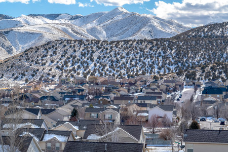 Utah Valley neighborhood on a sunny winter setting with Wasatch Mountain viewの写真素材
