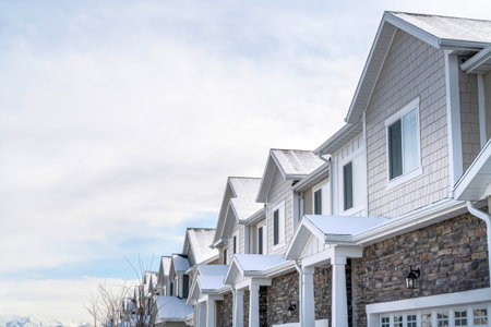 Row of houses in the scenic suburbs community with overcast sky backgroundの写真素材