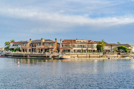 Luxury houses with private docks and view of the sea in Huntington Beach CAの写真素材