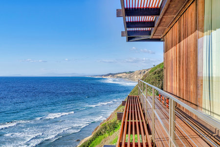Mountain home overlooking scenic ocean view and blue sky in San Diego Californiaの写真素材