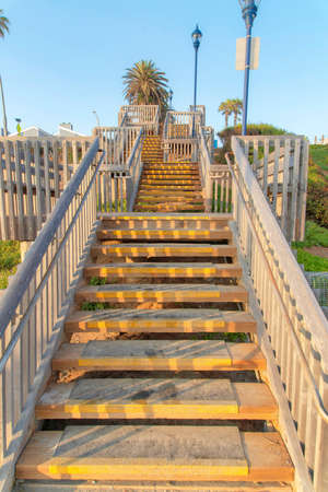 Outdoor stairs with anti-slip steps and lamp posts at Oceanside, Californiaの写真素材