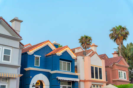 Colorful mediterranean houses in a low angle view at Oceanside, Californiaの写真素材