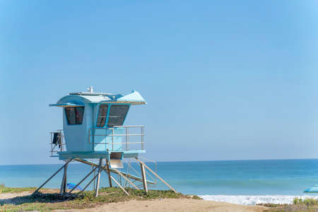 Light blue lifeguard house on the beach at San Clemente, California