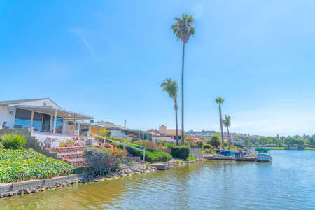 Residential houses on the shore of Lake San Marcos in San Diego, Californiaの写真素材